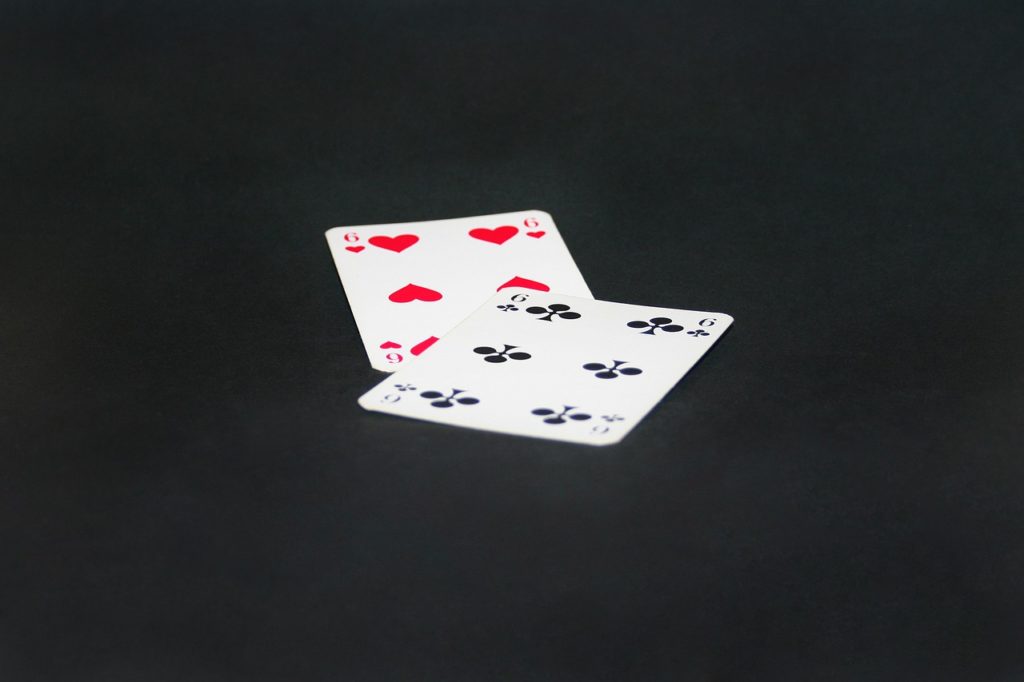 Online Baccarat - A close up of text on a black background - Crazy Eights